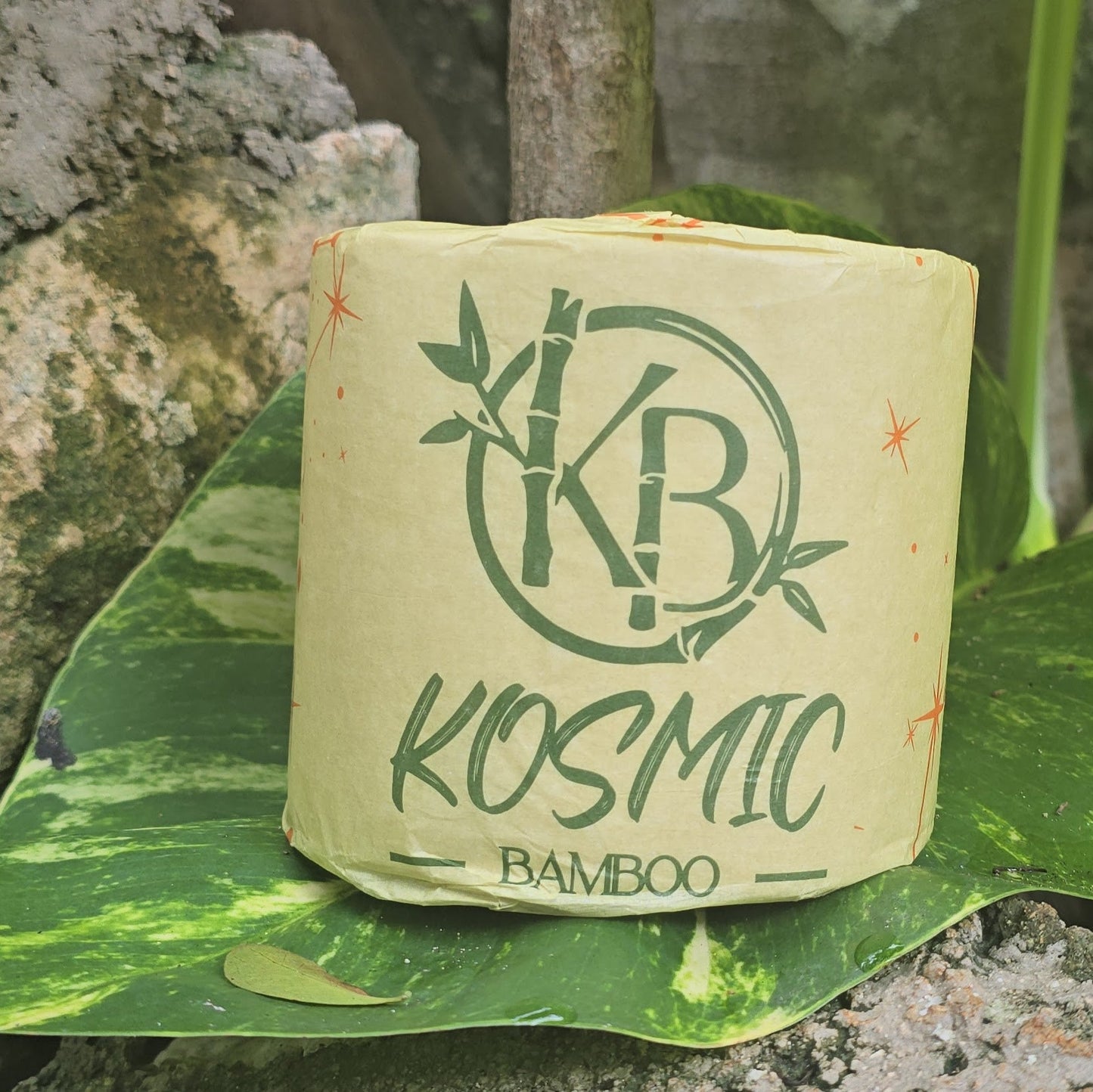 Kosmic Bamboo product packaging on a leaf with a natural background